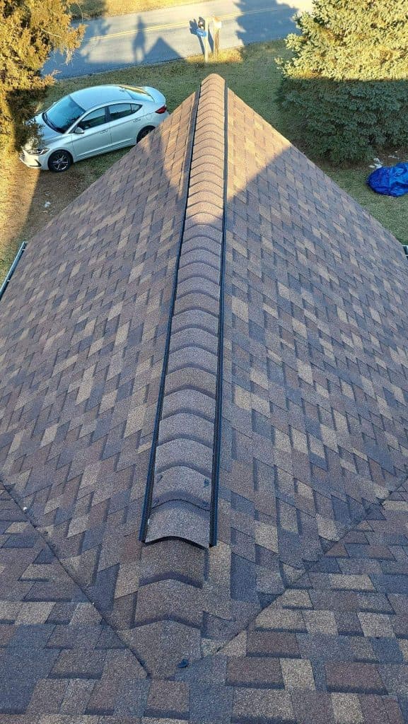 New architectural shingle roof installed on a home in Monrovia, Maryland