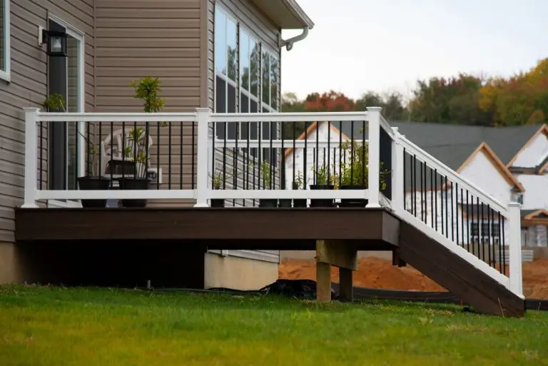 white and black deck railing family home