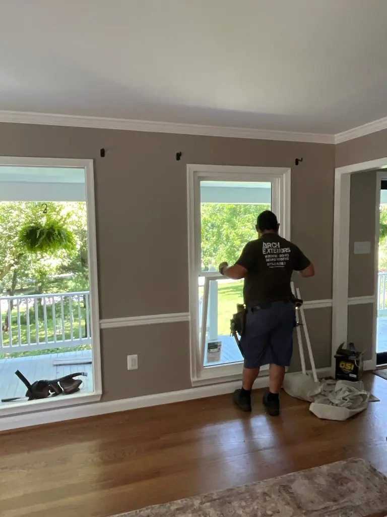 Our installer setting a new replacement window in a Frederick, Maryland home