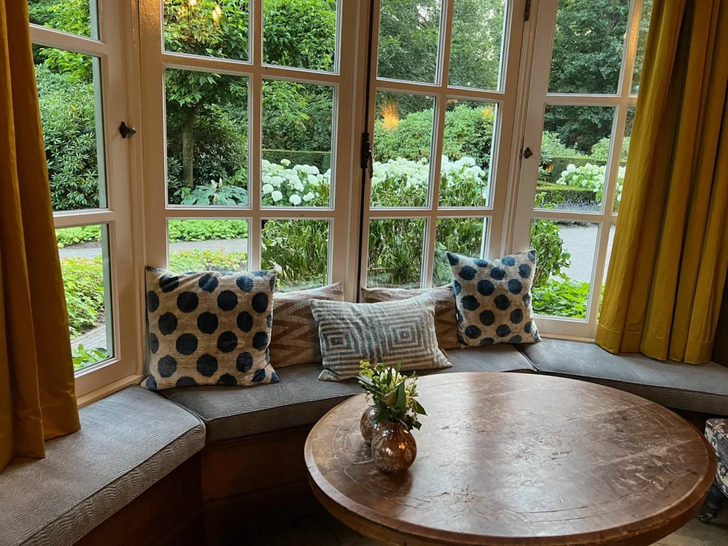 close up of home interior bay windows and reading nook