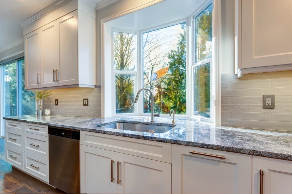 garden window in home kitchen behind sink