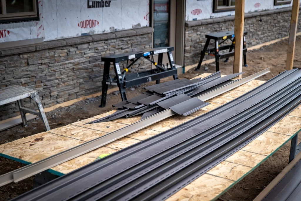 demonstration photo of how to cut vinyl siding on a table