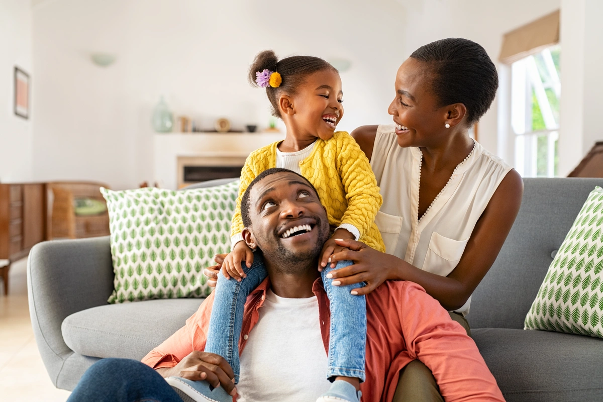 family laughing together roofing in Clarksburg