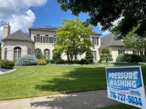 Exterior cleaning a house in Harris Hills, NY