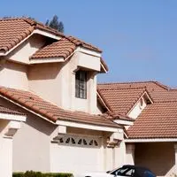 Stucco Exteriors, Shingle and Tile Roofs