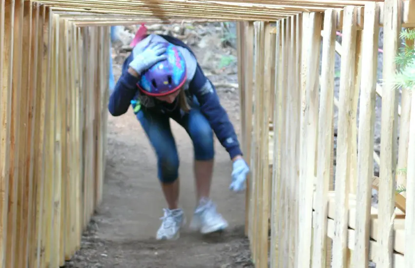Girl on Summer Camp Obstacle Course