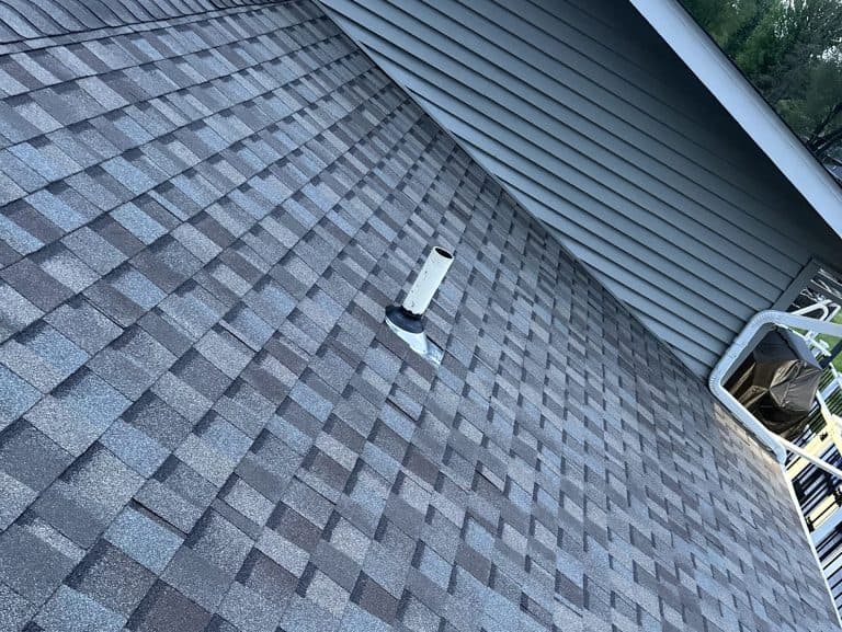 blue shingles roof and siding