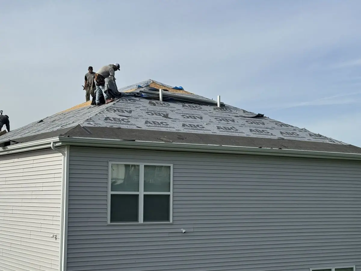 guys installing new shingles roof