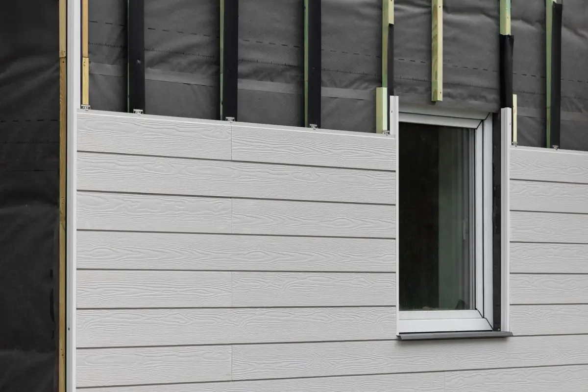siding moline wood texture composite cladding installation on house facade. WPC exterior wall panels