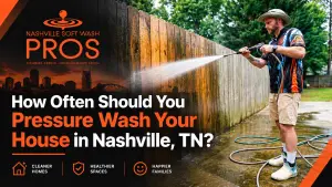 Nashville Soft Wash Pros technician pressure washing a wooden fence in Nashville, TN, with blog title about how often to pressure wash a house.