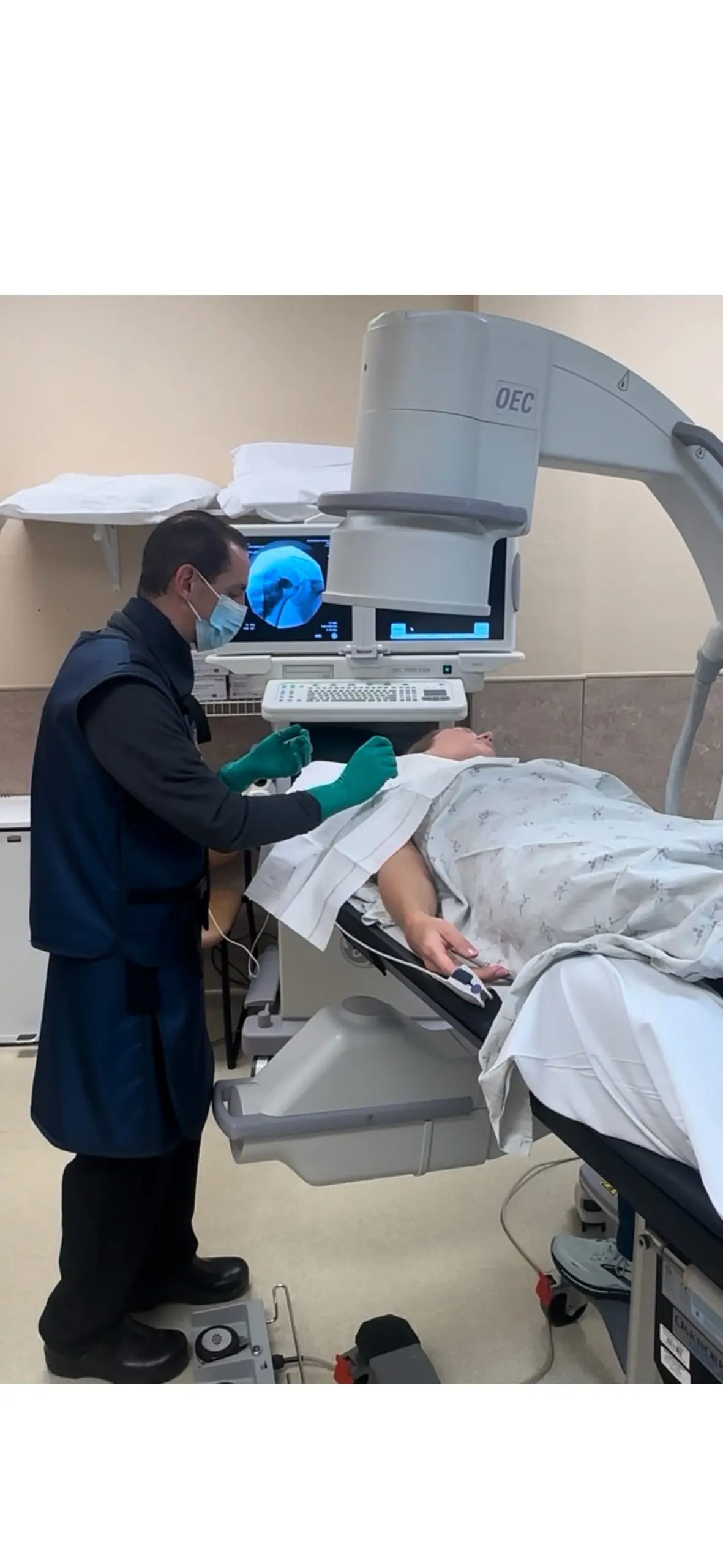 Dr. Jared Greenberg with a patient at NeuroSpine Center of Wisconsin