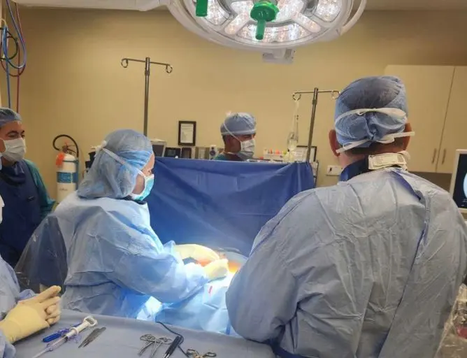 Dr. Amanda Greene performing the ReActiv8 procedure in the operating room