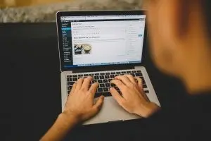 WordpressSEOTips1 | Search Strategy Marketing Creating a WordPress blog on a laptop with WordPress SEO tips for 2022