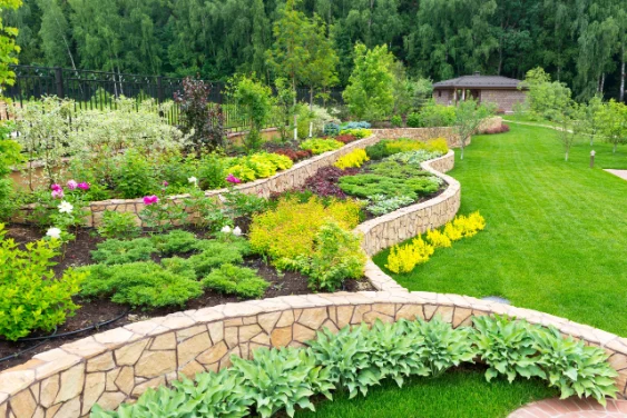 AdobeStock_67080749-scaled | Search Strategy Marketing Natural landscaping with low retaining walls and plants in home garden
