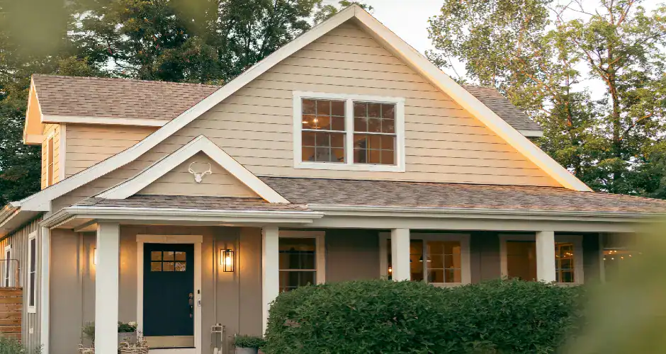 Beige home with gray roof showing warm neutral exterior colors