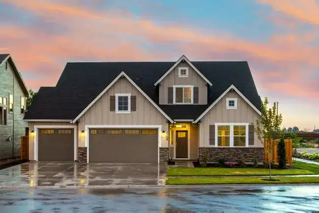 house with new brown garage doors.