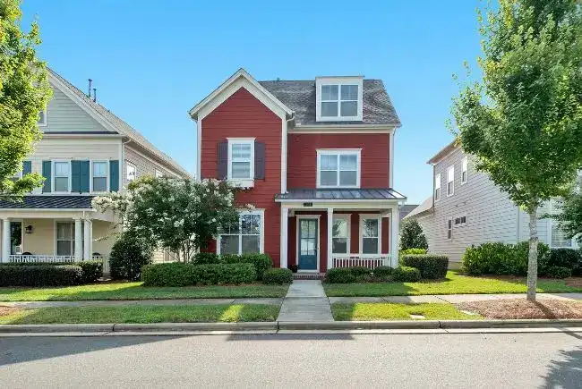 newly painted house with red exterior.