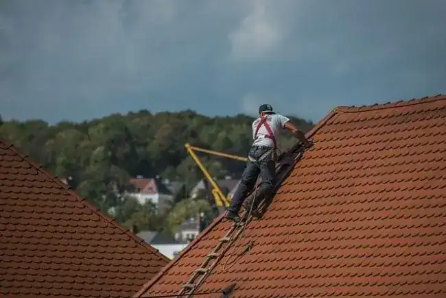 roofer working on a roofing project