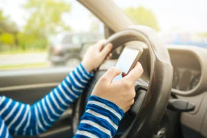 Woman driving car Image