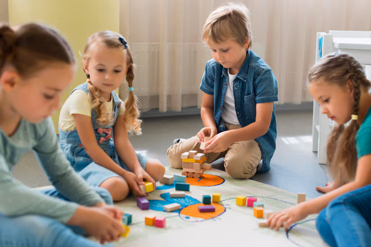 front view children playing together kindergarten 23 2148633303