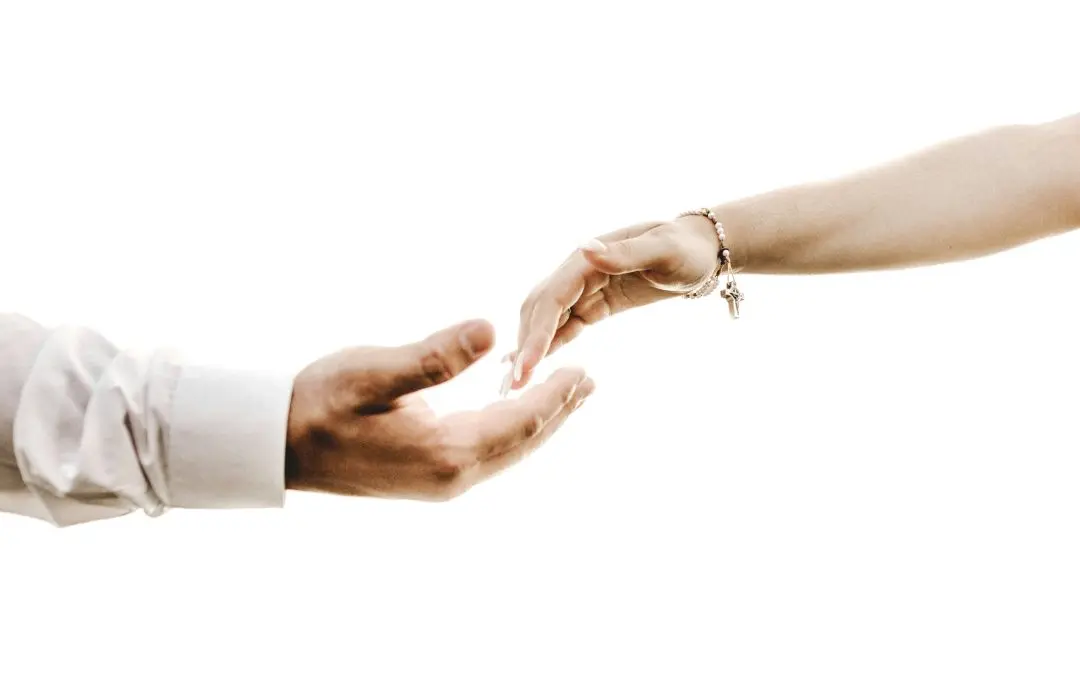 Spousal support in Texas represented by two hands exchanging financial support
