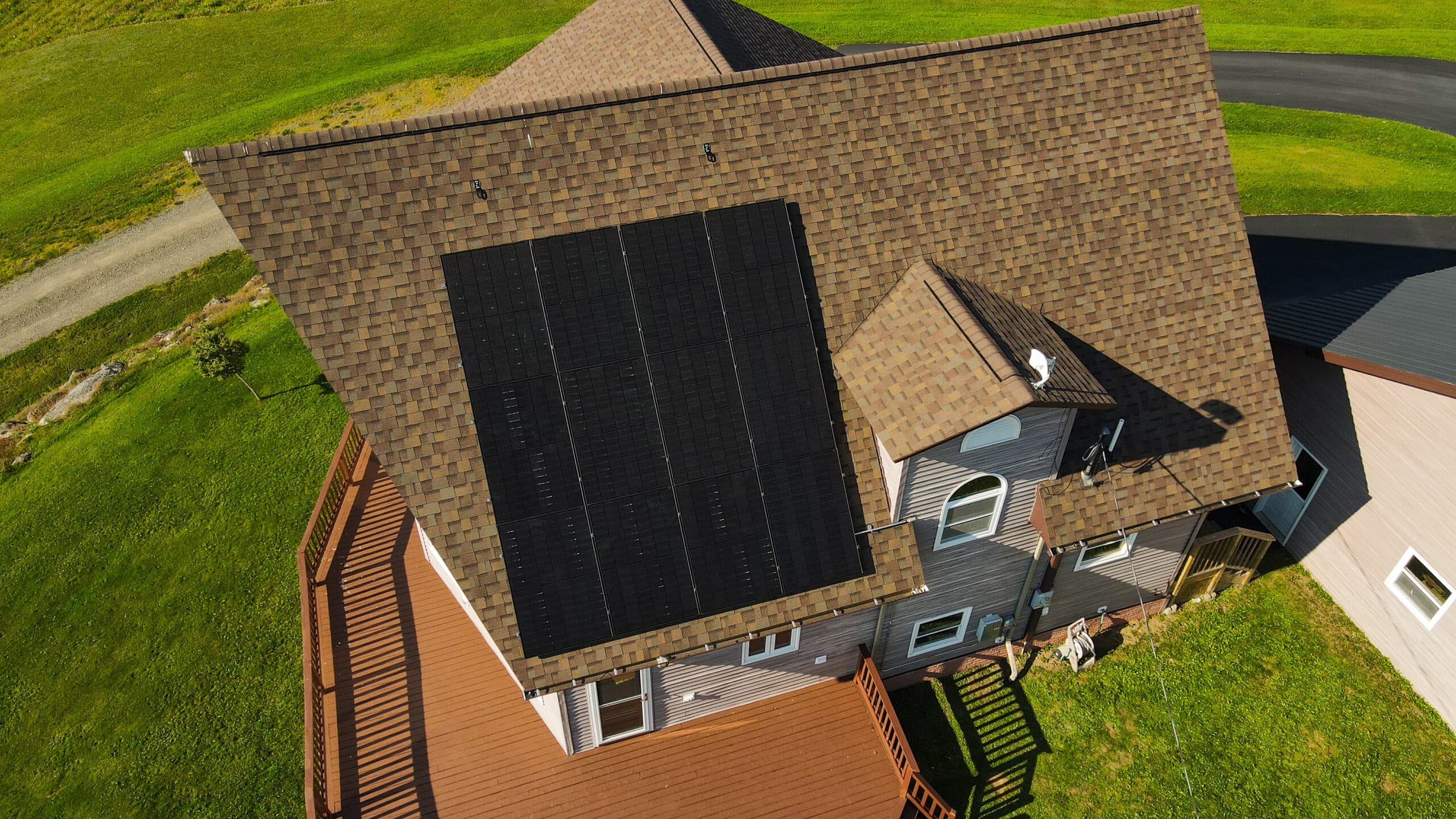 weird roof shape light brown shingles roof