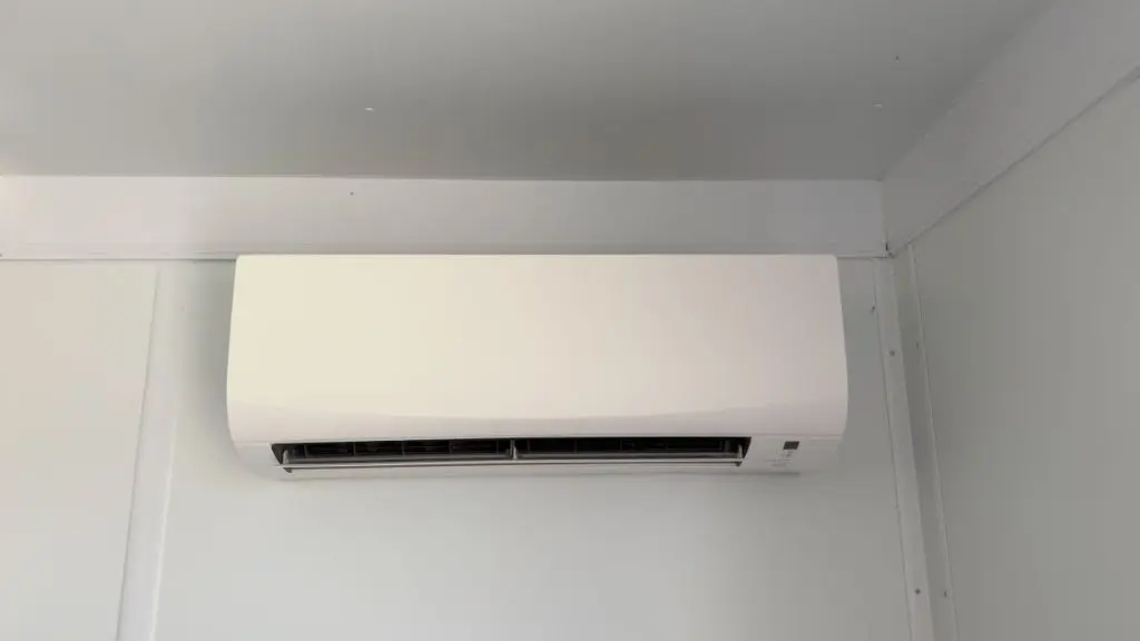 A-modern-white-ductless-mini-split-air-conditioner-mounted-on-a-wall
