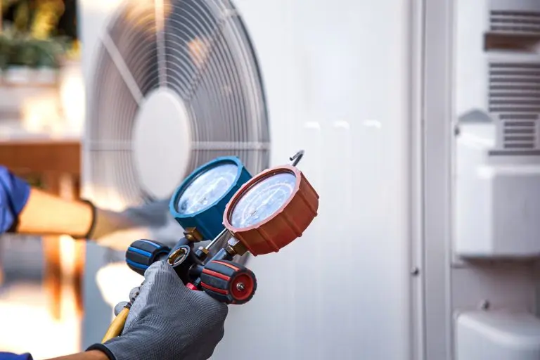 Heat and Air Conditioning, HVAC system service technician using