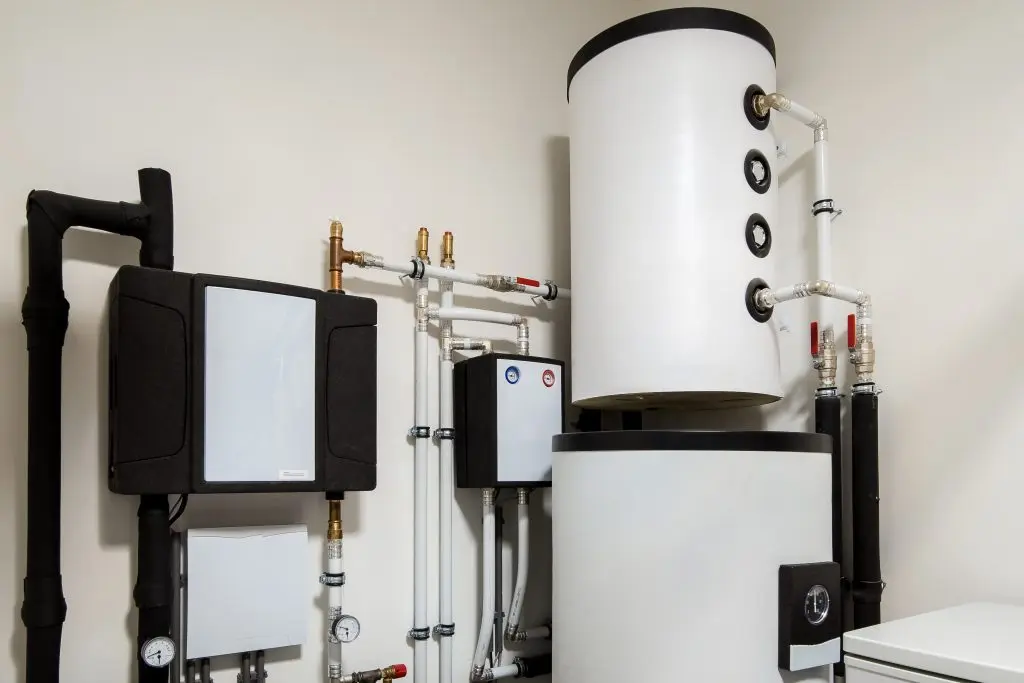 Modern sustainable heat pump installation for heating water and houses