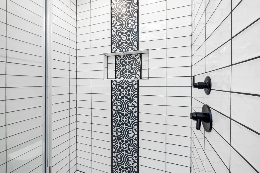 Subway tile grid pattern with black grout.