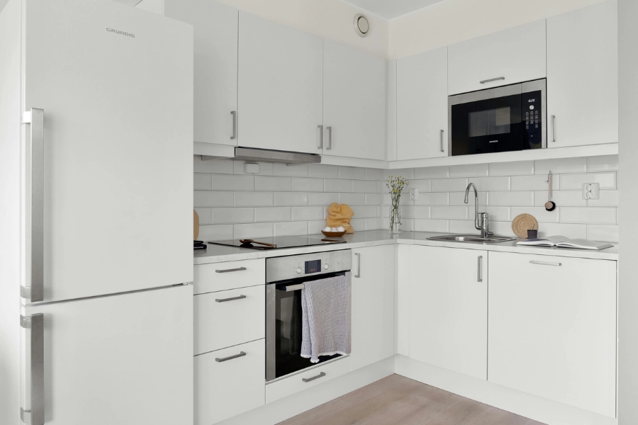 Modern white kitchen cabinets.
