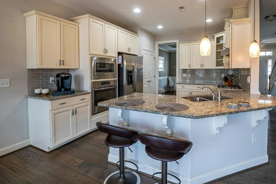 Kitchen with dark hardwood floors.