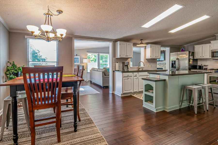 A rug complementing dark hardwood floors.
