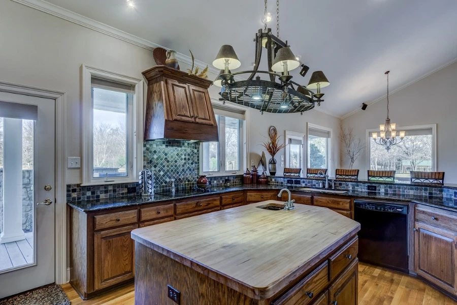 A kitchen island with wooden cabinets.