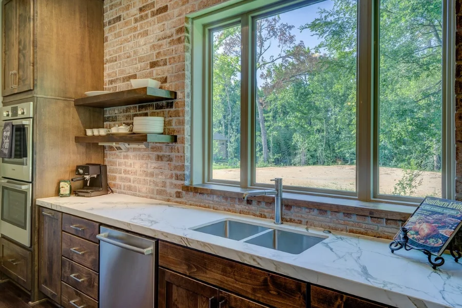 Kitchen cabinets and storage under the sink.
