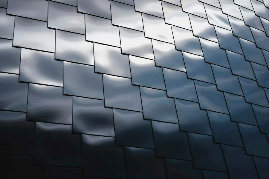 a close up of a building with a sky in the background