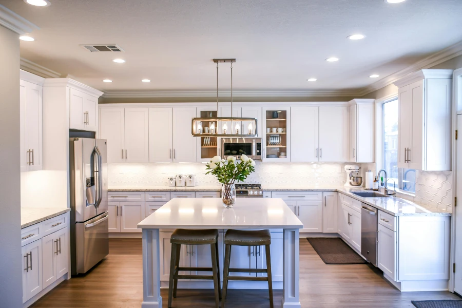 a clean and tidy kitchen with wood floor