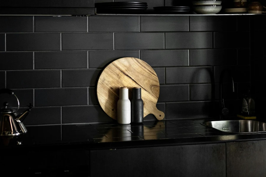 black tile backsplash