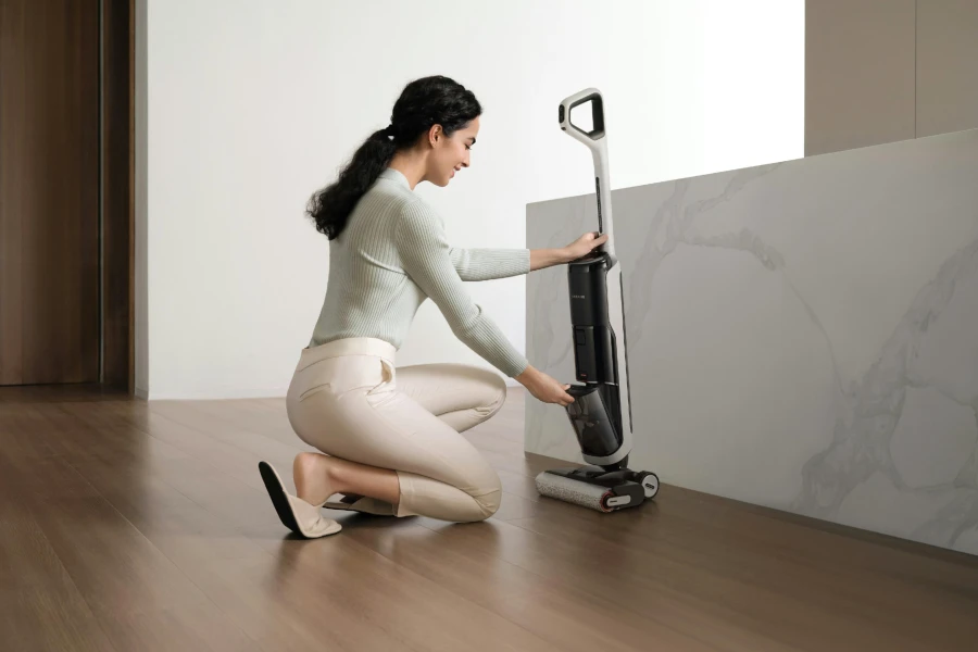 woman opening her vacuum cleaner
