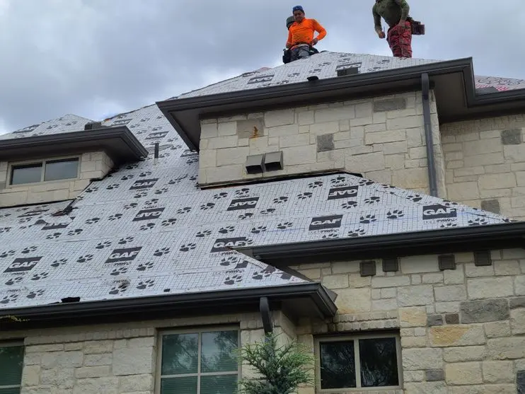 Residential Roof Installation – Precision Ridge and Vent Alignment
