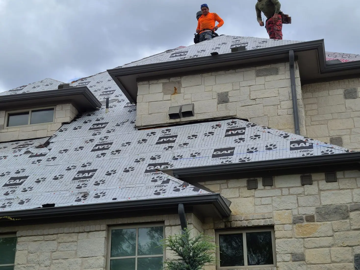 Residential Roof Installation – Precision Ridge and Vent Alignment