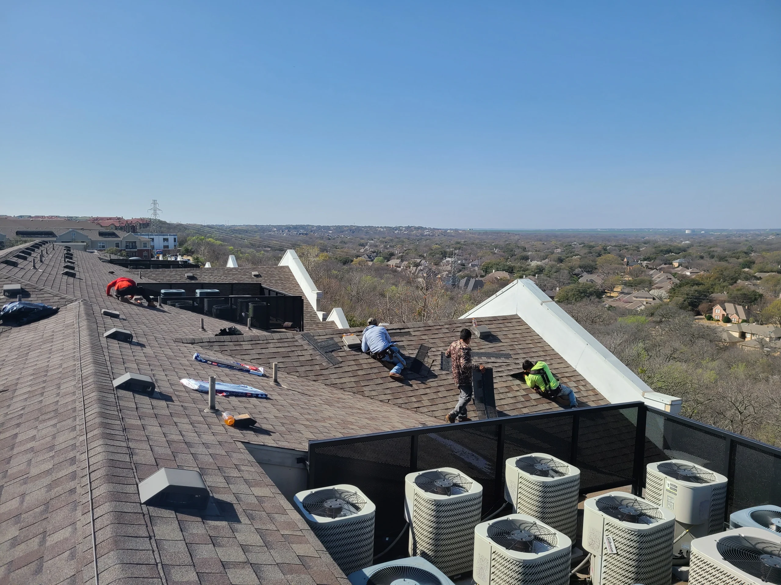 Shingle roof vent stacks with hilltop view