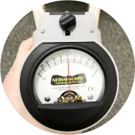 Chiropractic tool with dial for measurements.