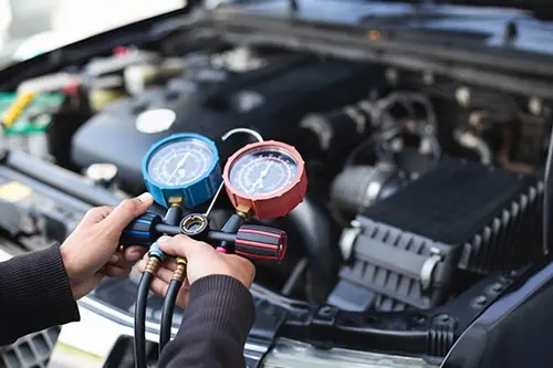 Car air conditioner check service leak test and fill refrigerant.