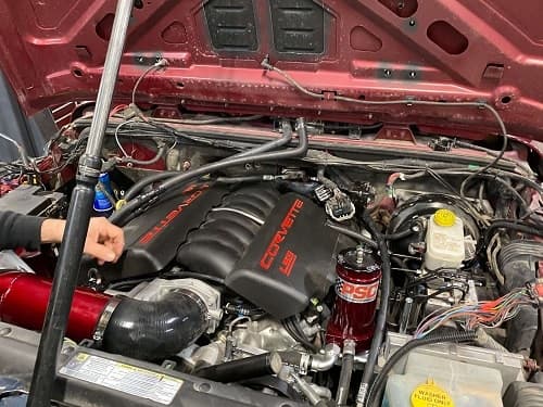 Open Corvette LS engine from GM at full display. Concept image of Engine Swap at Barney Brothers Off Road & Repair in Grand Junction, CO.