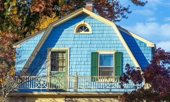 blue house with gambrel roof