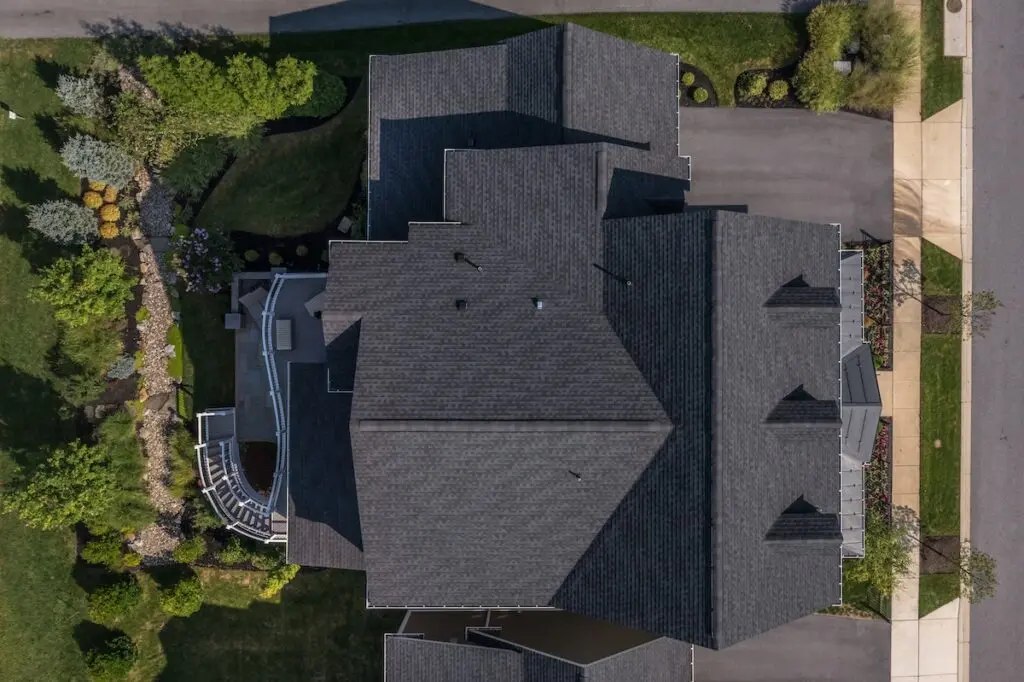 Aerial top down view of a complex hip and valley pitched roof 