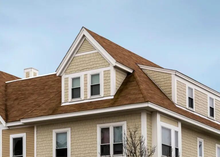 Roofing Lino Lakes Dormer windows on the sloped shingle roof of a newly built house