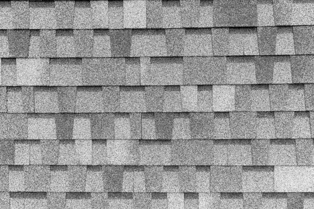 close up view of a grey shingle roof