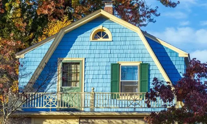 blue house with gambrel roof